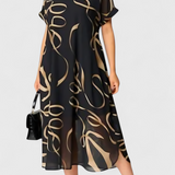 Elegante Vestido Caftán Jillian Negro con Estampado Abstracto en Oro y Diseño en Escote en V