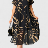 Elegante Vestido Caftán Jillian Negro con Estampado Abstracto en Oro y Diseño en Escote en V