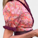Elegante vestido asimétrico de manga abullonada de Louisa