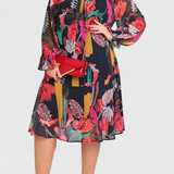 Elegante Vestido Midi Floral Annegret con Mangas Largas y Corte Suelto