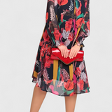 Elegante Vestido Midi Floral Annegret con Mangas Largas y Corte Suelto