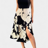 Elegante vestido Raquel con top de punto y falda floral con abertura para un estilo sofisticado