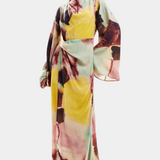 Elegante Vestido Maxi con Estampado de Acuarela y Diseño Frontal Torcido para un Estilo Sofisticado