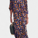 Teodora Vestido Retro con Elegante Escote en V y Encantadoras Mangas Abullonadas