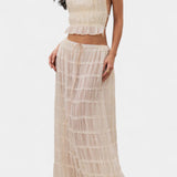 Eugenie Conjunto a Juego con Elegante Top Plisado y Falda Moderna