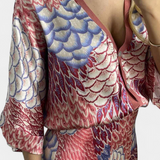 Conjunto Elegante de Blusa y Falda de Cola de Pez con Estampado Floral