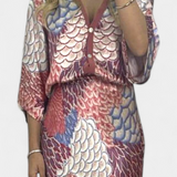 Conjunto Elegante de Blusa y Falda de Cola de Pez con Estampado Floral