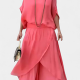 Elegante Conjunto de Dos Piezas con Top Holgado y Falda Asimétrica - La Perfecta Combinación de Estilo y Comodidad