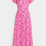 Elegante vestido maxi floral con escote en V y mangas aladas para un look sofisticado