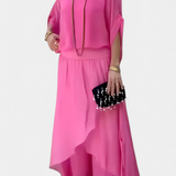 Elegante Conjunto de Dos Piezas con Top Holgado y Falda Asimétrica - La Perfecta Combinación de Estilo y Comodidad