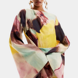 Elegante Vestido Maxi con Estampado de Acuarela y Diseño Frontal Torcido para un Estilo Sofisticado