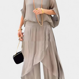 Elegante Conjunto de Dos Piezas con Top Holgado y Falda Asimétrica - La Perfecta Combinación de Estilo y Comodidad