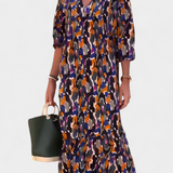Teodora Vestido Retro con Elegante Escote en V y Encantadoras Mangas Abullonadas
