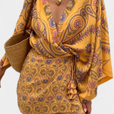 Vestido Boho Candela con Estampado Floral y Escote en V Cruzado para un look con estilo