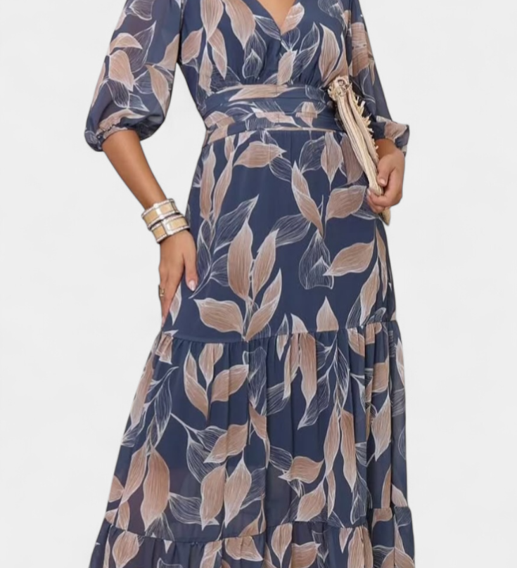 Elegante vestido largo floral Aísha con corte fluido y hermoso estampado de hojas