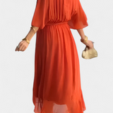 Luisa Elegante vestido largo con escote en V y caída fluida