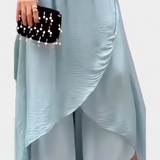 Elegante Conjunto de Dos Piezas con Top Holgado y Falda Asimétrica - La Perfecta Combinación de Estilo y Comodidad