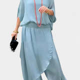 Elegante Conjunto de Dos Piezas con Top Holgado y Falda Asimétrica - La Perfecta Combinación de Estilo y Comodidad