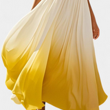Elegante vestido maxi halter plisado Starla con detalles de perlas perfectos para ocasiones especiales