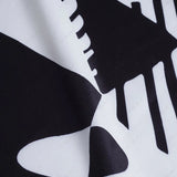 Conjunto de Pierna Ancha Basilisa con Estampado de Grafiti - Estilo Moderno y Vibrante