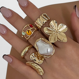 Elegante anillo abierto con diseño de flor líquida decorada con perlas