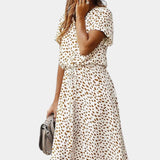 Rovena Vestido Midi de Lunares con Cuello Camisero y Cintura Ajustable - Elegancia y Comodidad para Cualquier Ocasión