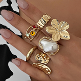 Elegante anillo abierto con diseño de flor líquida decorada con perlas