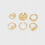 Anillo de Múltiples Capas con Diseño Irregular Elegante