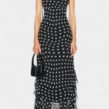 Estefanía Elegante Vestido de Gasa con Volantes y Lunares en Negro y Crema para un Estilo Sofisticado