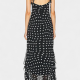 Estefanía Elegante Vestido de Gasa con Volantes y Lunares en Negro y Crema para un Estilo Sofisticado