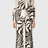 Set de Dos Piezas con Hombros a Descubrir y Pantalones Amplios con Estampado Elegante