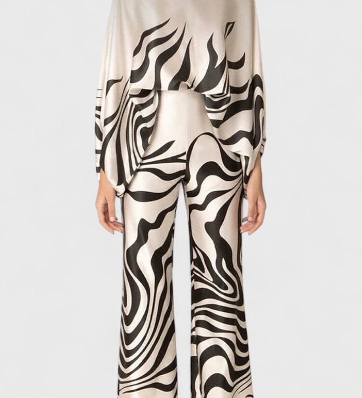 Set de Dos Piezas con Hombros a Descubrir y Pantalones Amplios con Estampado Elegante