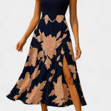 Elegante vestido Raquel con top de punto y falda floral con abertura para un estilo sofisticado