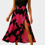 Elegante vestido Raquel con top de punto y falda floral con abertura para un estilo sofisticado