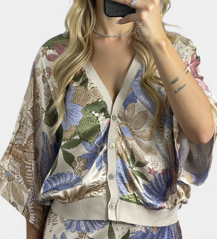 Conjunto Elegante de Blusa y Falda de Cola de Pez con Estampado Floral