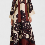 Elegante vestido largo Maritza con cuello alto y romántico estampado de Grenadilla