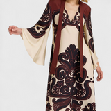 Elegante vestido largo Maritza con cuello alto y romántico estampado de Grenadilla