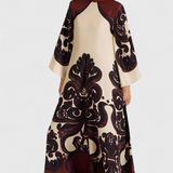 Elegante vestido largo Maritza con cuello alto y romántico estampado de Grenadilla