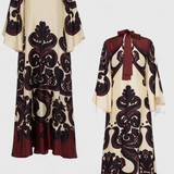 Elegante vestido largo Maritza con cuello alto y romántico estampado de Grenadilla