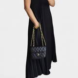 Elegante Manuela Vestido Sin Mangas con Pliegues y Cintura Alta para un Estilo Sofisticado