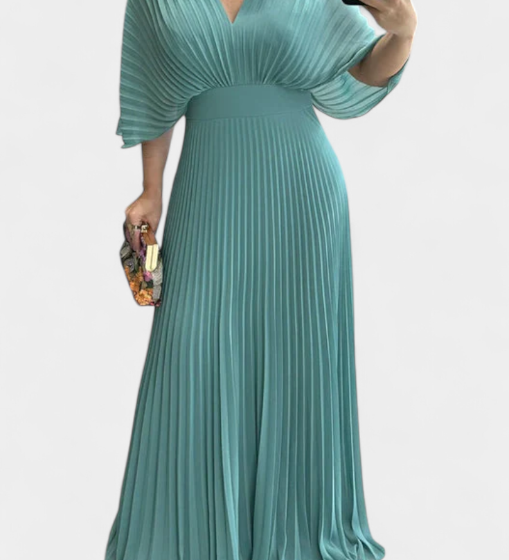 Elegante vestido plisado fluido con espalda abierta para ocasiones memorables