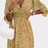 Benicia - Vestido Floral de Manga Abullonada y Dobladillo Juguetón para un look encantador
