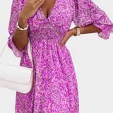 Benicia - Vestido Floral de Manga Abullonada y Dobladillo Juguetón para un look encantador