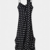 Estefanía Elegante Vestido de Gasa con Volantes y Lunares en Negro y Crema para un Estilo Sofisticado