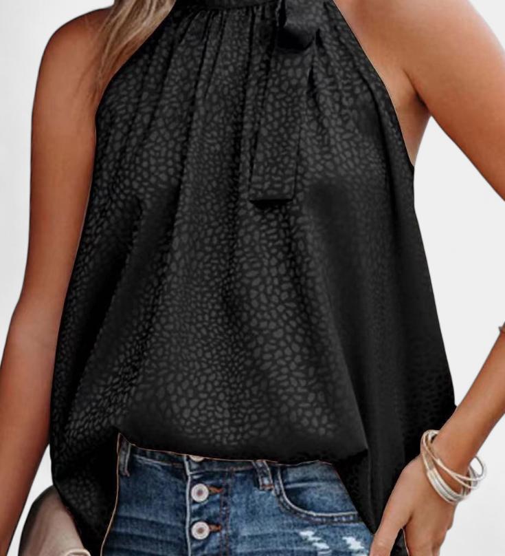 Elegante Adela Top sin mangas con estampado de leopardo, cuello alto y lazo para un estilo atrevido y sofisticado