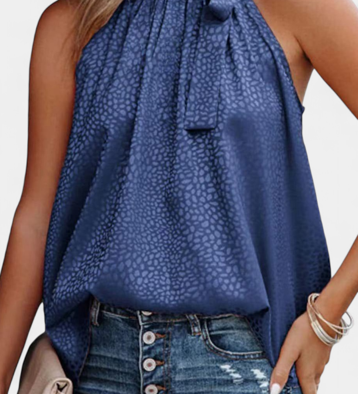 Elegante Adela Top sin mangas con estampado de leopardo, cuello alto y lazo para un estilo atrevido y sofisticado