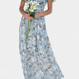 Elegante vestido maxi floral con escote en V y mangas aladas para un look sofisticado