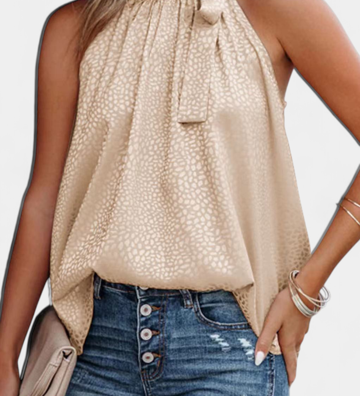 Elegante Adela Top sin mangas con estampado de leopardo, cuello alto y lazo para un estilo atrevido y sofisticado