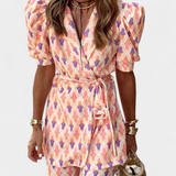 Conjunto Araceli de estampado vibrante con blazer y pantalón campana para un estilo sofisticado y a la moda