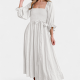 Elegante vestido de dos niveles Petra con cuerpo fruncido y mangas abullonadas para un estilo sofisticado
